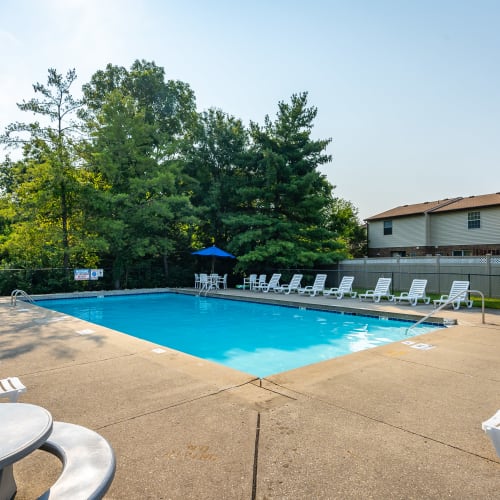 Sparkling swimming pool and sundeck lounge seating at Brixworth Apartments in Cincinnati, Ohio