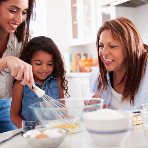 a family baking together at Stone Park in Lemoore, California