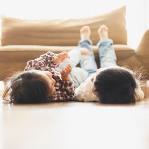 a coupe of kids lying on the floor at Santa Rosa in Point Mugu, California