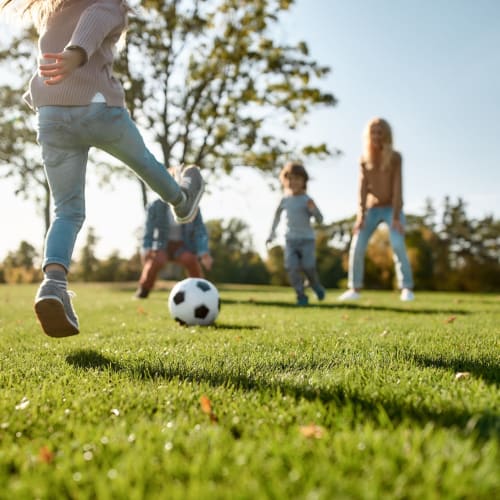 kids playing with a soccer ball at Shadow Mountain in Twentynine Palms, California