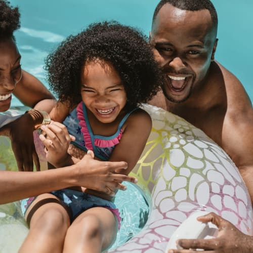 a family swimming at Shadow Mountain in Twentynine Palms, California