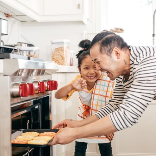 a resident baking with his daughter at Coral Sea Cove in Port Hueneme, California