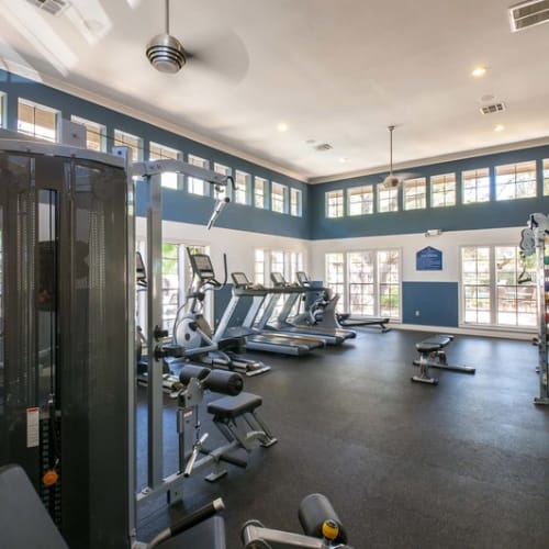 Resident fitness center with cardio machines and weight machines at Sonterra Heights in San Antonio, Texas