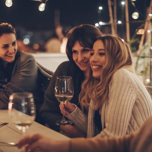 residents out to drink wine at River Place in Lakeside, California