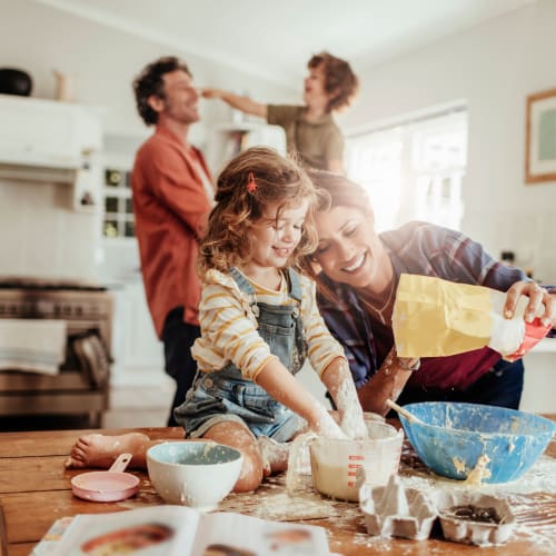 a mother and daughter baking together at Forster Hills in Oceanside, California