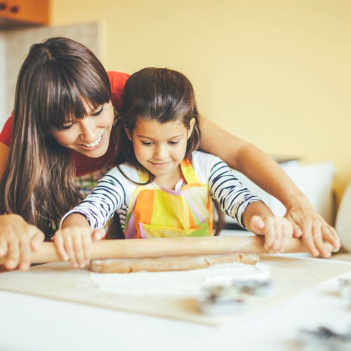 a mother and daughter baking together at Norwich Manor in Norfolk, Virginia