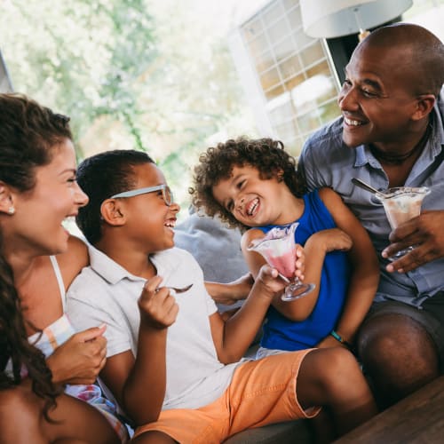 A happy family eating ice cream near Castle Acres in Norfolk, Virginia