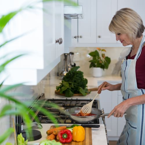 a resident cooking at home at Sandpiper Crescent in Virginia Beach, Virginia