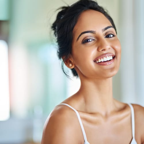 a smiling resident at The Village at New Gosport in Portsmouth, Virginia