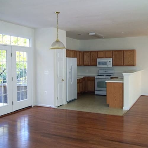 An layout living area with kitchen at Geiger Ridge in Quantico, Virginia