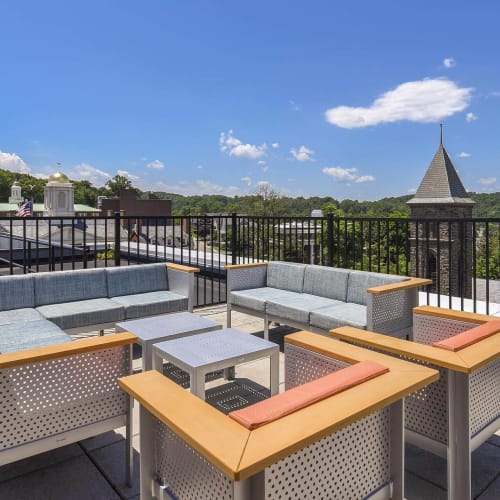 Rooftop lounge chairs and tables at The Monroe, Morristown, New Jersey