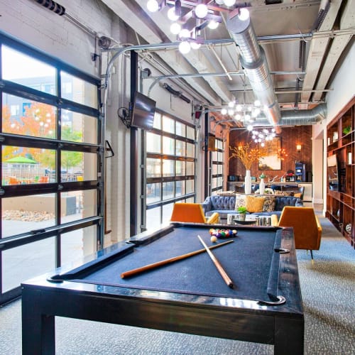 Resident clubhouse with pool table at Circa Apartments in Indianapolis, Indiana