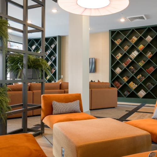 Orange seating area in the lobby of Quill in Atlanta, Georgia