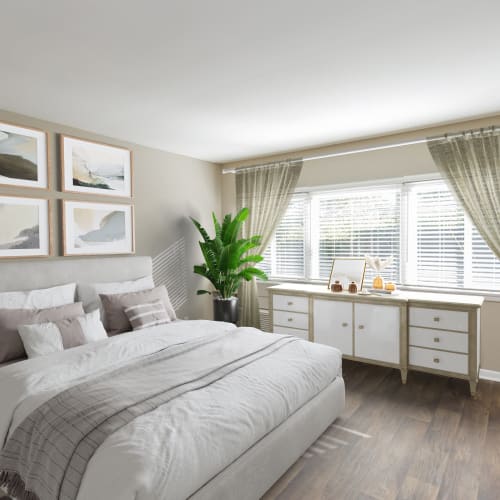 Bedroom with plush carpeting at Belmont Place Apartments in Nashville, Tennessee