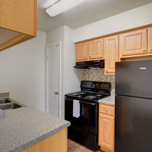 Summit 7700 W airport blvd garden style apartments interior kitchen
