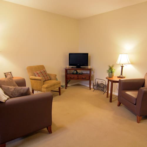 Tv room with lots of chairs at Oxford Springs Edmond in Edmond, Oklahoma