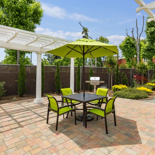 Outdoor seating area at Coronado Apartments in Fremont, California