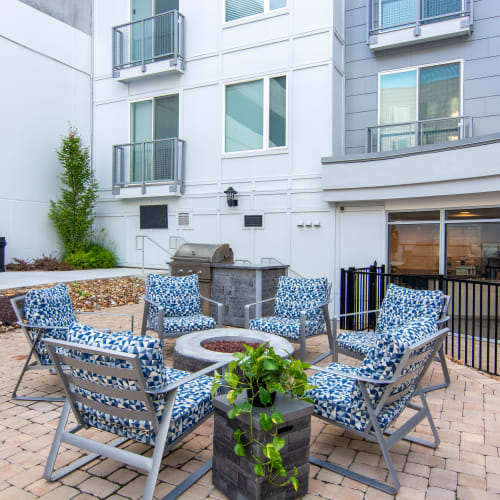 A firepit surrounded by outdoor seats at Innslake Place in Glen Allen, Virginia