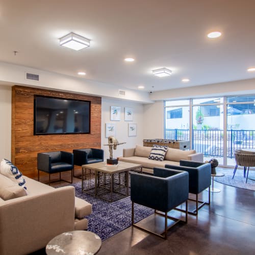 Comfortable lounge seating in an entertainment area of the clubhouse at Innslake Place in Glen Allen, Virginia