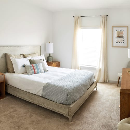 Plush carpeting in a furnished bedroom at The Station at Fleming Island in Fleming Island, Florida