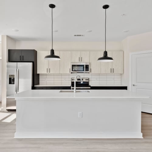 Spacious kitchen in a model home at The Station at Fleming Island in Fleming Island, Florida