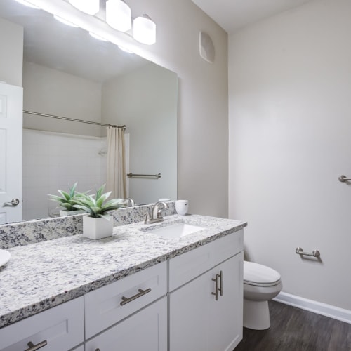 Granite countertops in an apartment bathroom at North Hills at Town Center in Raleigh, North Carolina