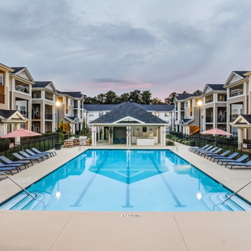 The sparkling community pool in front of the leasing center at North Hills at Town Center in Raleigh, North Carolina