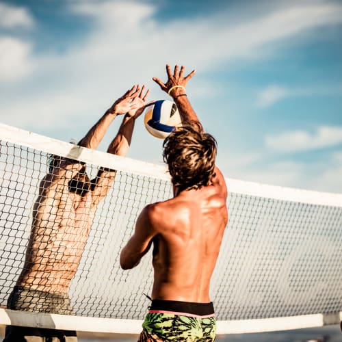 Residents enjoying the sand volleyball courts near The Veridian in Bend, Oregon
