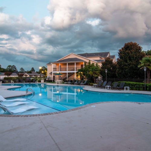 Resort-style swimming pool at Houston Lake Apartments in Kathleen, Georgia