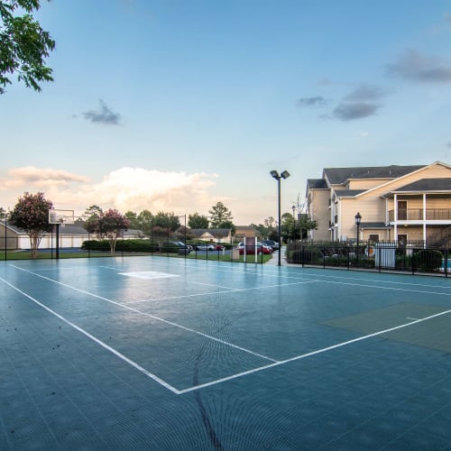 The community basketball court at Houston Lake Apartments in Kathleen, Georgia
