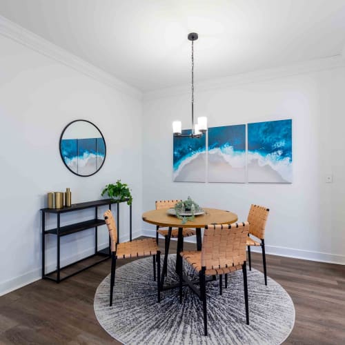 Dining room with modern table at Spring Water Apartments in Virginia Beach, Virginia