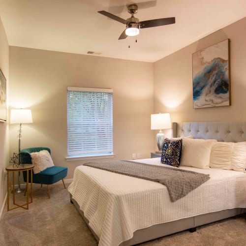 Bedroom with plush carpet at River Forest in Chester, Virginia