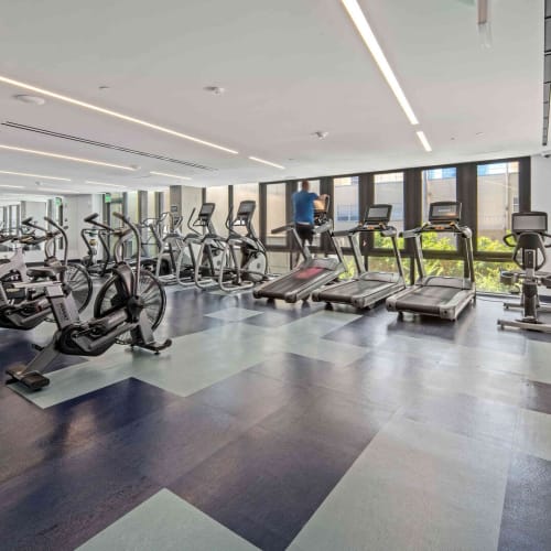 Resident fitness center with cardio equipment at Josephine DTLA in Los Angeles, California