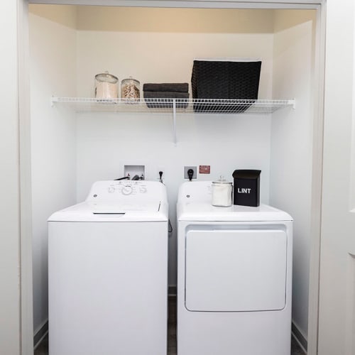 A full-sized washer and dryer in an apartment at Integra Trails in Cocoa, Florida