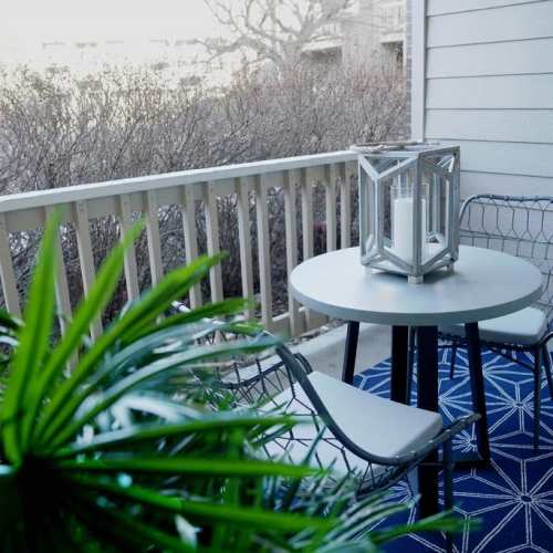 Balcony with chairs at GrandView @ Flatirons in Louisville, Colorado