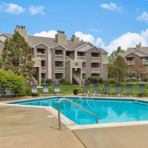 Building with poolside at GrandView @ Flatirons in Louisville, Colorado
