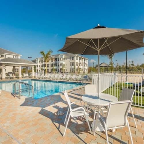 Poolside with seating at The Olivia in Homestead, Florida