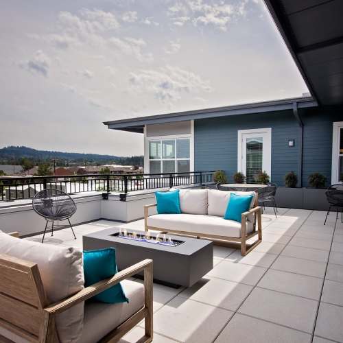 Outdoor seating at the sky deck lounge at Attwell Off Main in Tigard, Oregon