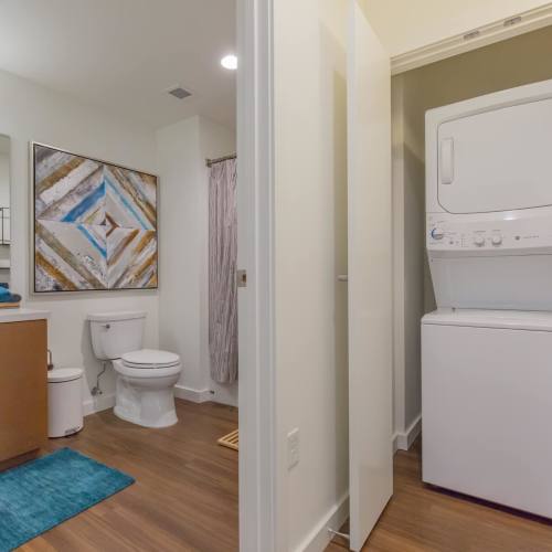 Bathroom with washer and dryer at Linden in Portland, Oregon