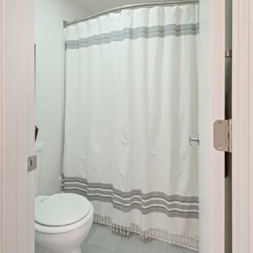 Bright bathroom with mirror at Sullivan's Ridge in Portland, Oregon