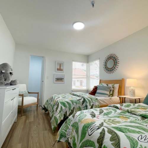 Spacious bedroom with ambient lighting at Emerald Grove in Orlando, Florida, 