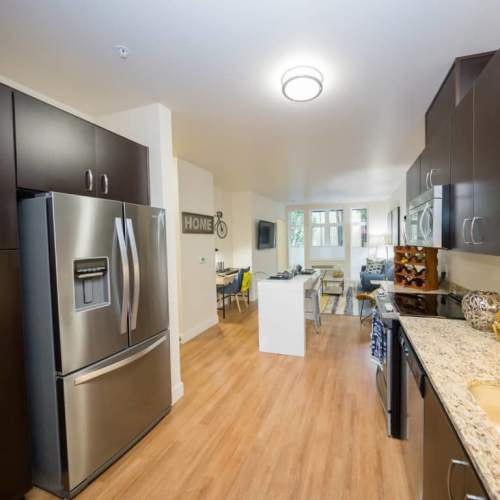 Kitchen with hard wood flooring at The Cameron in Portland, Oregon