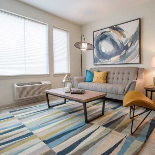 Living room with a bright window at LoHi Gold in Denver, Colorado