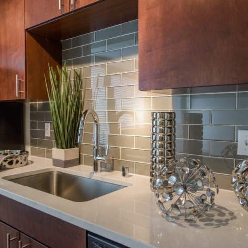 Blue tile backsplash in a kitchen at LoHi Gold in Denver, Colorado