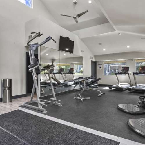 Fitness studio with treadmills and weight machines at Walker Landing in Aurora, Colorado, 