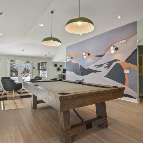 Shuffleboard in resident lounge at Walker Landing in Aurora, Colorado,  
