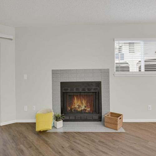 Living room with fireplace at Walker Landing in Aurora, Colorado, 