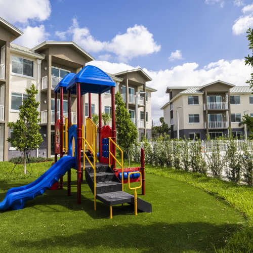 Playground with sliders at Palm Beach Preserve in West Palm Beach, Florida 