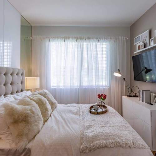 Bedroom with television at Palm Beach Preserve in West Palm Beach, Florida  
