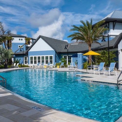 The sparkling community swimming pool at Integra Trails in Cocoa, Florida